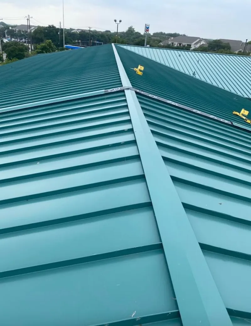 Green commercial metal roof ridge and valley for Metal Roof Repair in Justice